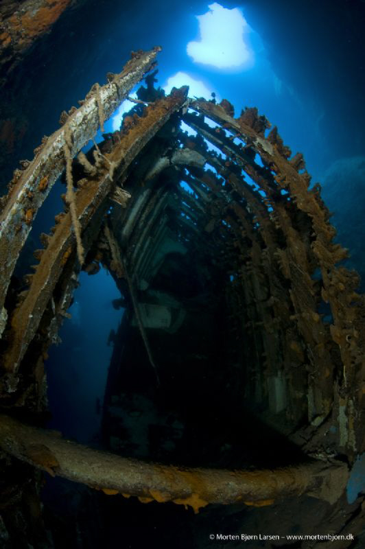 A wreck has slipped into a hole/cave in Kalymnos - Greece by Morten Bjorn Larsen 