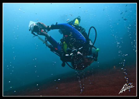 diving near an active VOLCANO! streams of warm bubbles co... by Adriano Trapani 