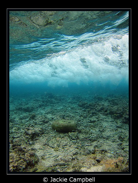 Wave breaking over a shallow reef.
Canon S90, manual set... by Jackie Campbell 