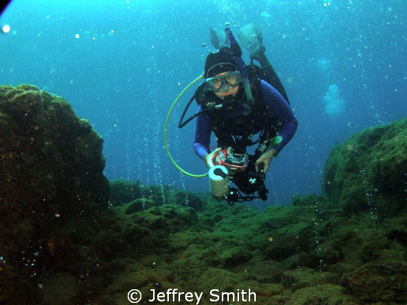 Enjoying the bubbles and warm water from the geothermal a... by Jeffrey Smith 
