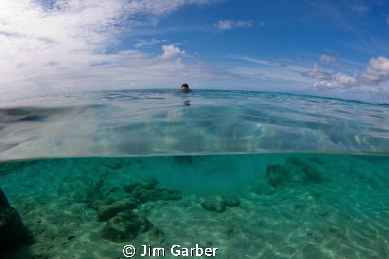 Getting ready for beach dive in Bonaire by Jim Garber 