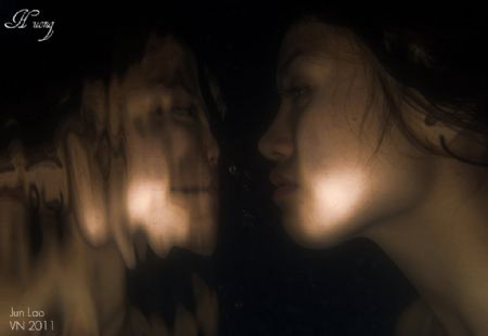the looking glass by Jun Lao 