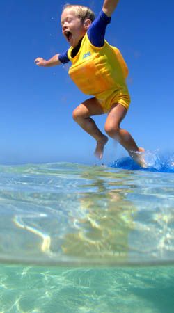 Learning to swim, Coral Bay - Western Australia by Penny Murphy 