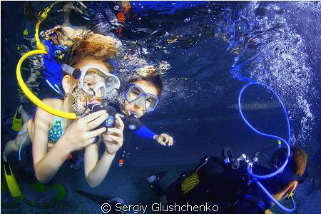 Children diving. by Sergiy Glushchenko 