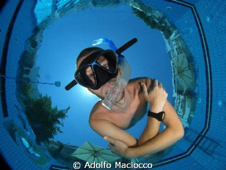 Self/portrait in the pool by Adolfo Maciocco 