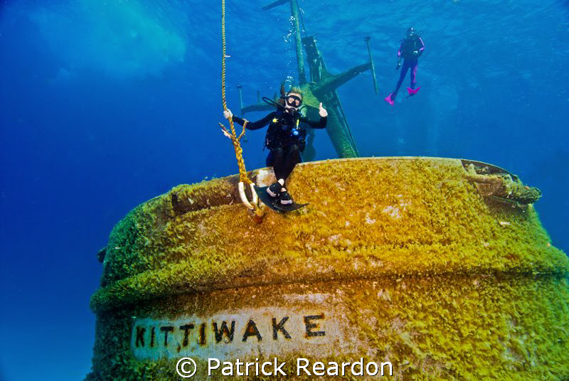 My daughter, Jenny, on the back rail of the Kittiwake, Gr... by Patrick Reardon 