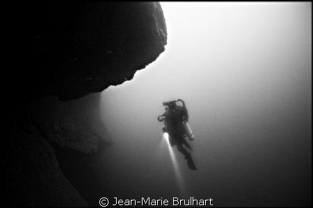 Out of nowhere, this diver came back from a deep dive as ... by Jean-Marie Brulhart 