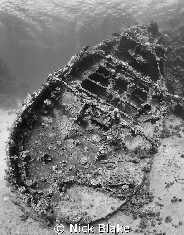 a shot of the Tug Boat wreck, Abu Galawa with black and w... by Nick Blake 