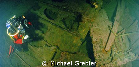 My dive buddy looks to check on me before moving to anoth... by Michael Grebler 