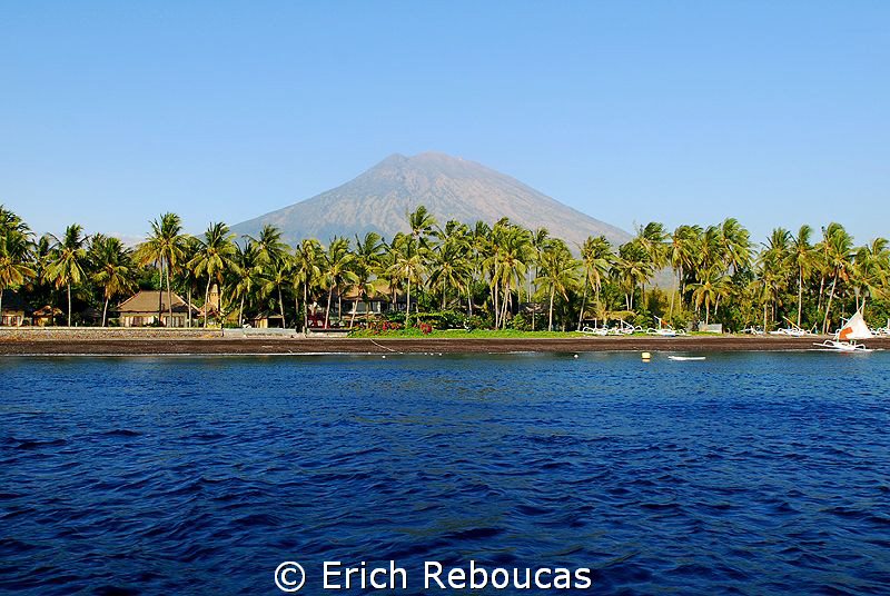 Black sand beach and the Agung volcano, Tulamben, Bali by Erich Reboucas 