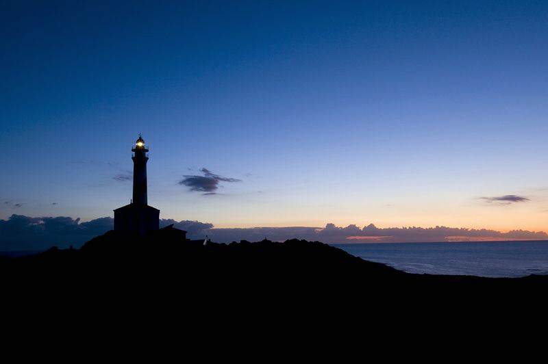 The lighthouse Favaritx on the north coast from the beaut... by Roland Bach 