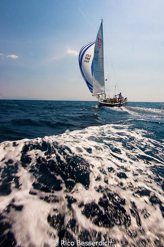 Yacht race rehearsal ( and me behind them, following in a... by Rico Besserdich 