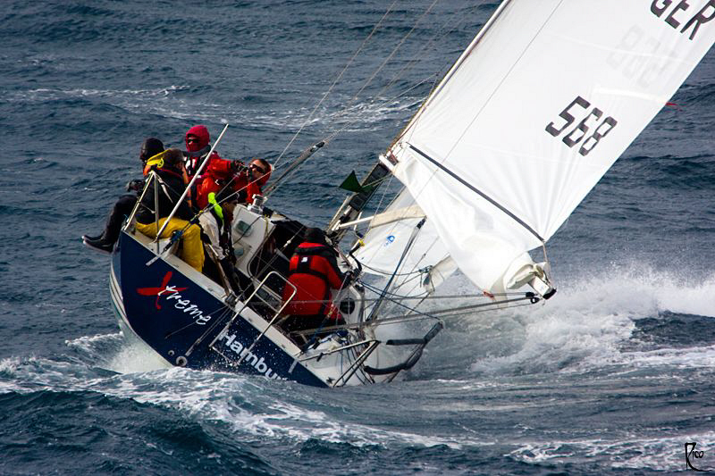 Racing Sailboat. It's not only the boat's name....the cre... by Rico Besserdich 