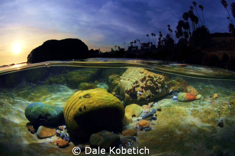 in the shallows laguna beach sunset by Dale Kobetich 