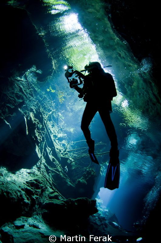 Silhouete from cenote by Martin Ferak 