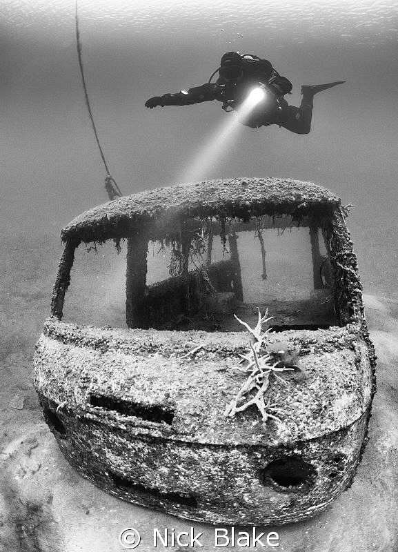 Diver over Van wreck, Wraysbury Lake.
Natural light, Bla... by Nick Blake 