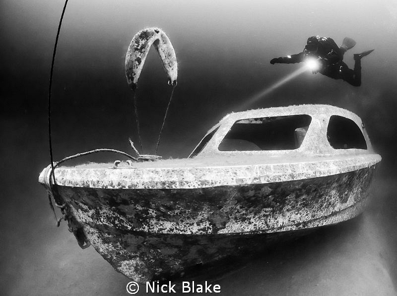 Diver and small boat wreck, Wraysbury
Black and white co... by Nick Blake 