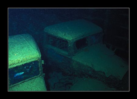 Trucks inside the Thistlegorm, standing next to each othe... by Johannes Felten 