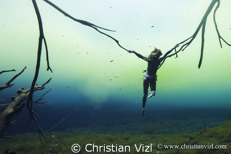 Selkie woman at cenote Carwash, Quintana Roo, México. by Christian Vizl 