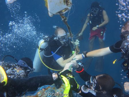 Everyone is holding on for decompression after a deep div... by Rita Hung 