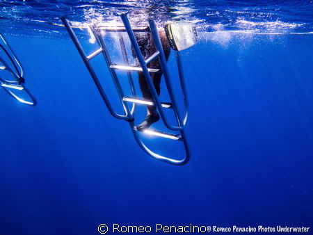 blue water in orange canyon , cayman islands by Romeo Penacino 