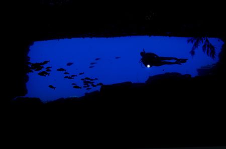 TV room. Looking out from one of the many caves in Niihau... by Rand Mcmeins 