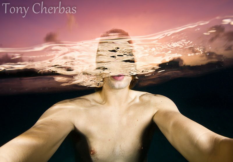 Head in Red Clouds: Self Portrait F9, 1/3 sec, ISO 100. (... by Tony Cherbas 