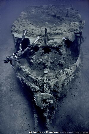 wreck with spearfisherman by Andreas Dimitriou 