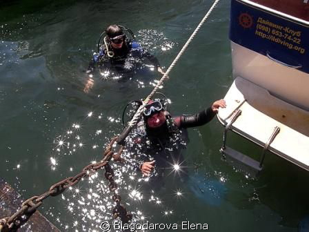 Each diver has Neptune bunch of star flowers if he is smi... by Blagodarova Elena 