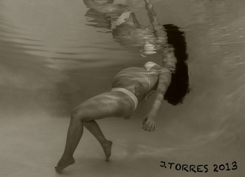 My first picture of my unborn child underwater.  Future d... by Juan Torres 
