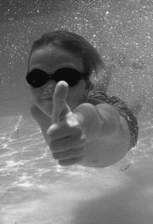 my son swimming by Gregory Grant 