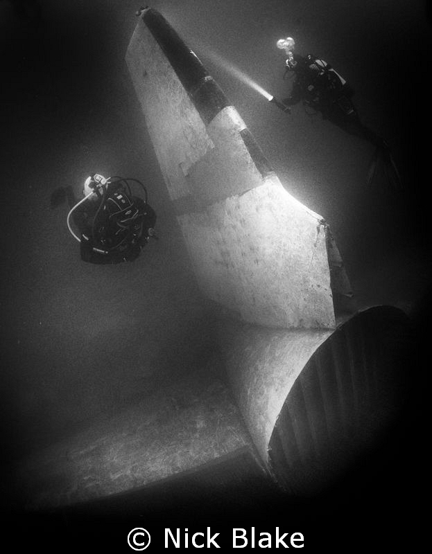 Jet Tail Plane and divers, Capernwray, UK
 by Nick Blake 