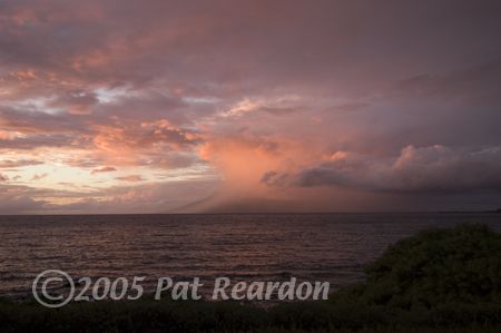 Waiting for the sunset, I look over and see a heavy rain ... by Patrick Reardon 
