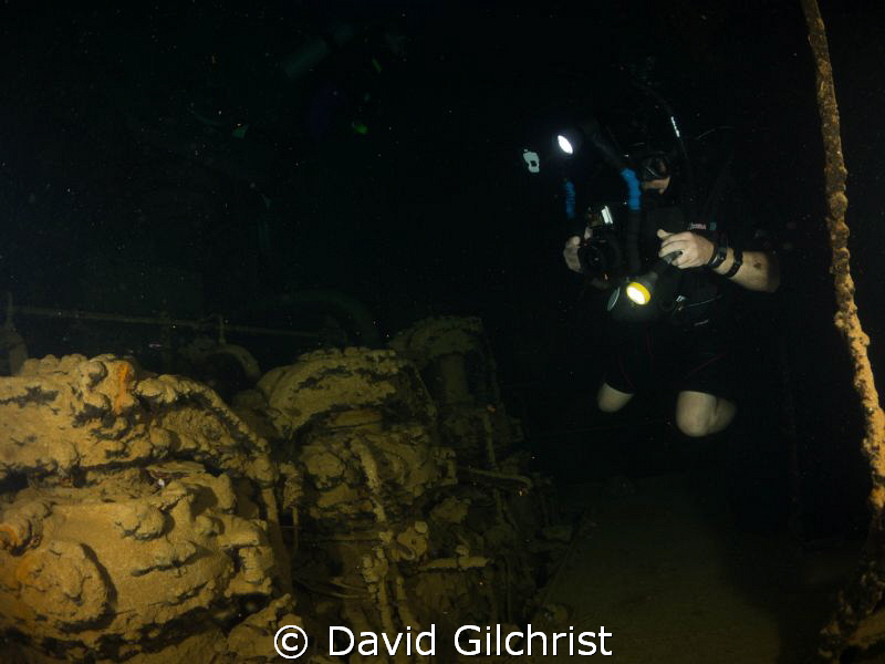 Engine room exploration, Kanshu Maru, Truk Lagoon by David Gilchrist 