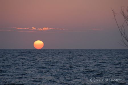 Big orange ball sinkin' in the water... by Patrick Reardon 