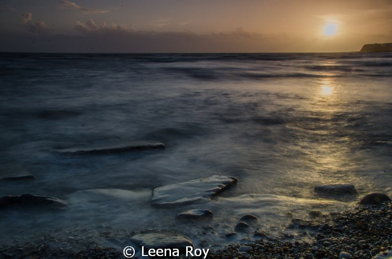 Kimmeridge bay at sunset by Leena Roy 