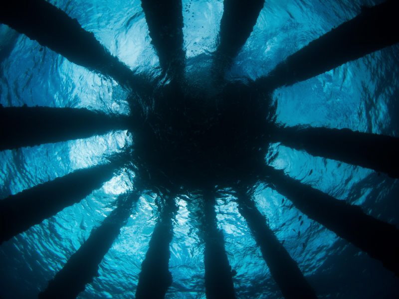 Abstract view of the Cement Plant pier, Barbados - lookin... by Paul Colley 