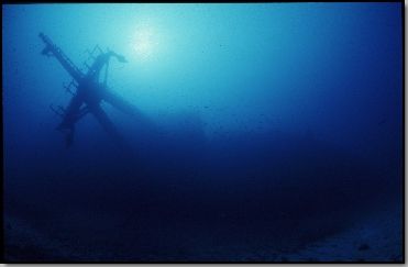 Chaouen ship sunk and still waving the mast in her slow a... by Jean-claude Zaveroni 