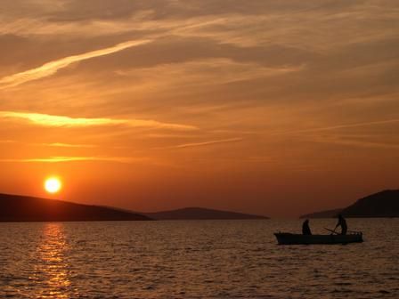 Fishing at sunset by Damir Skific 