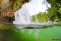 Behind the water falls 