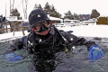 This ice diver has just completed his "bubble checks" with his buddy at the start of their dive. Canon 6D and 15mm lens. Cropped and colour corrected. 