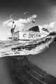 "Lookout"
A dive master stands on the swim platform of a boat tied up above the Kittiwake. 