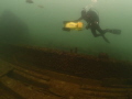 Diver exploring the wreck of the wooden Steamer 'Raleigh' in Lake Erie, near Port Colborne,Ontario. 