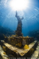 This statue was mounted to the sea floor off Key Largo FL in 1965 and still sits in 25 feet of water to this day. 