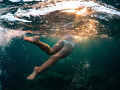 Swimming under Mediterranean sunset 