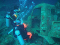 Do you think we can get it started! Picture taken at the "Car Pile" Vaersen Bay, Curacao. Depth 130 ft. 