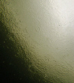 "Dark Side Of The Moon"   
Raindrops seen from the underside appear like craters on the surface of the moon.... 