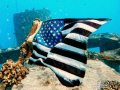 Someone place a flag on the YO-257 shipwreck just before Labor Day weekend.  The mild current had it billowing out like it was flying in the wind. 