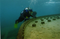 Diver examines boiler on the 'Wetmore', Fathom Five National Marine Park, Tobermory 