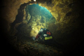 Freshwater cave system Hart Springs in North Florida. Notice the rush of bubbles from the diver, there is very high flow in this cave system. 